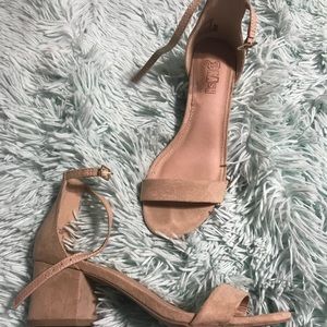 Tan suede heels.